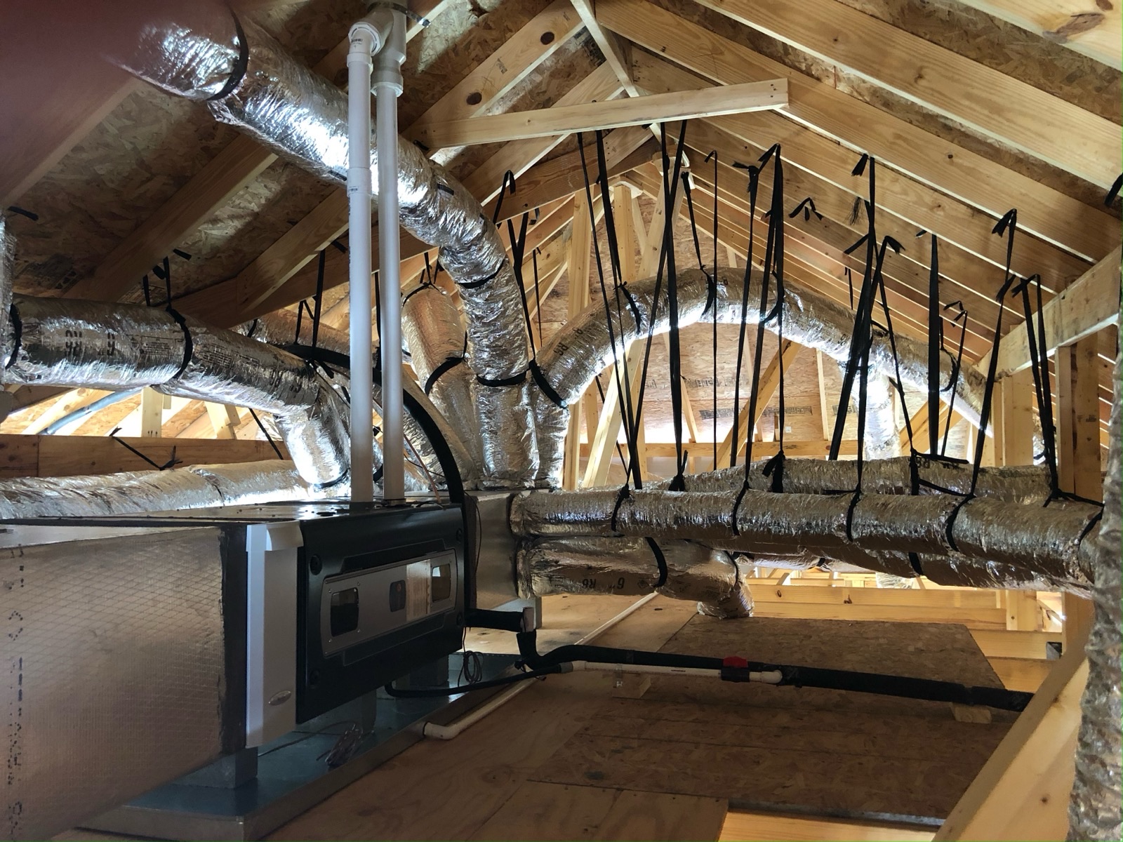 Attic ductwork inspection by MD Air technician
